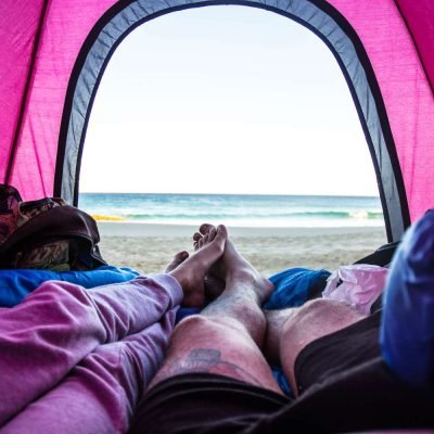 low-section-of-people-in-tent-against-sky-924614162-fb50d599ebf5452fb1c1d32a3b47d5a2